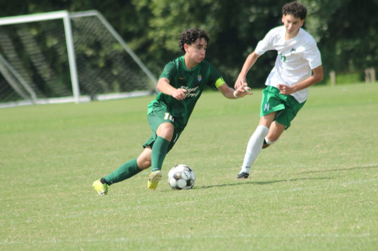 The captain drives at goal