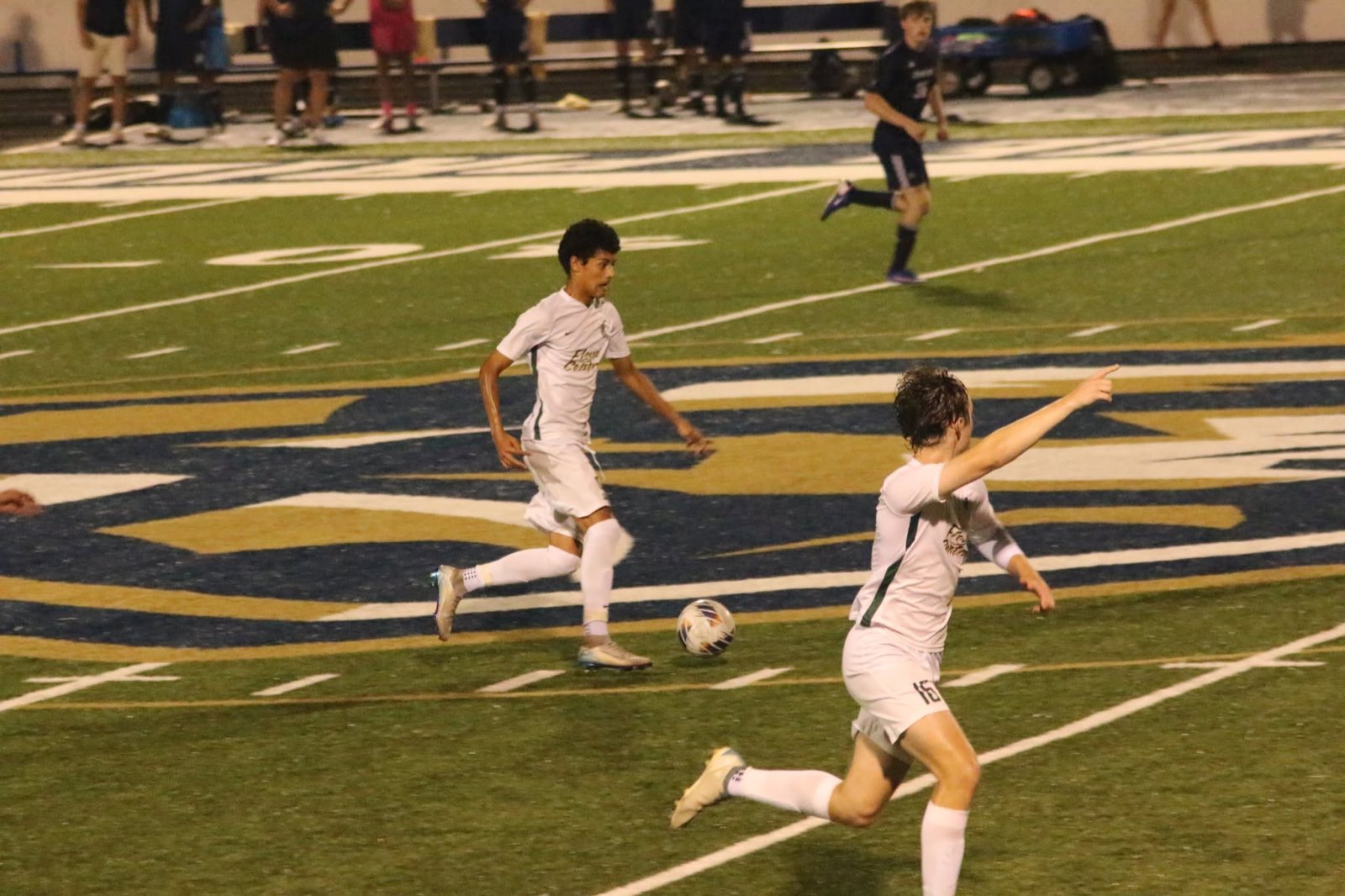 On the ball in the away whites