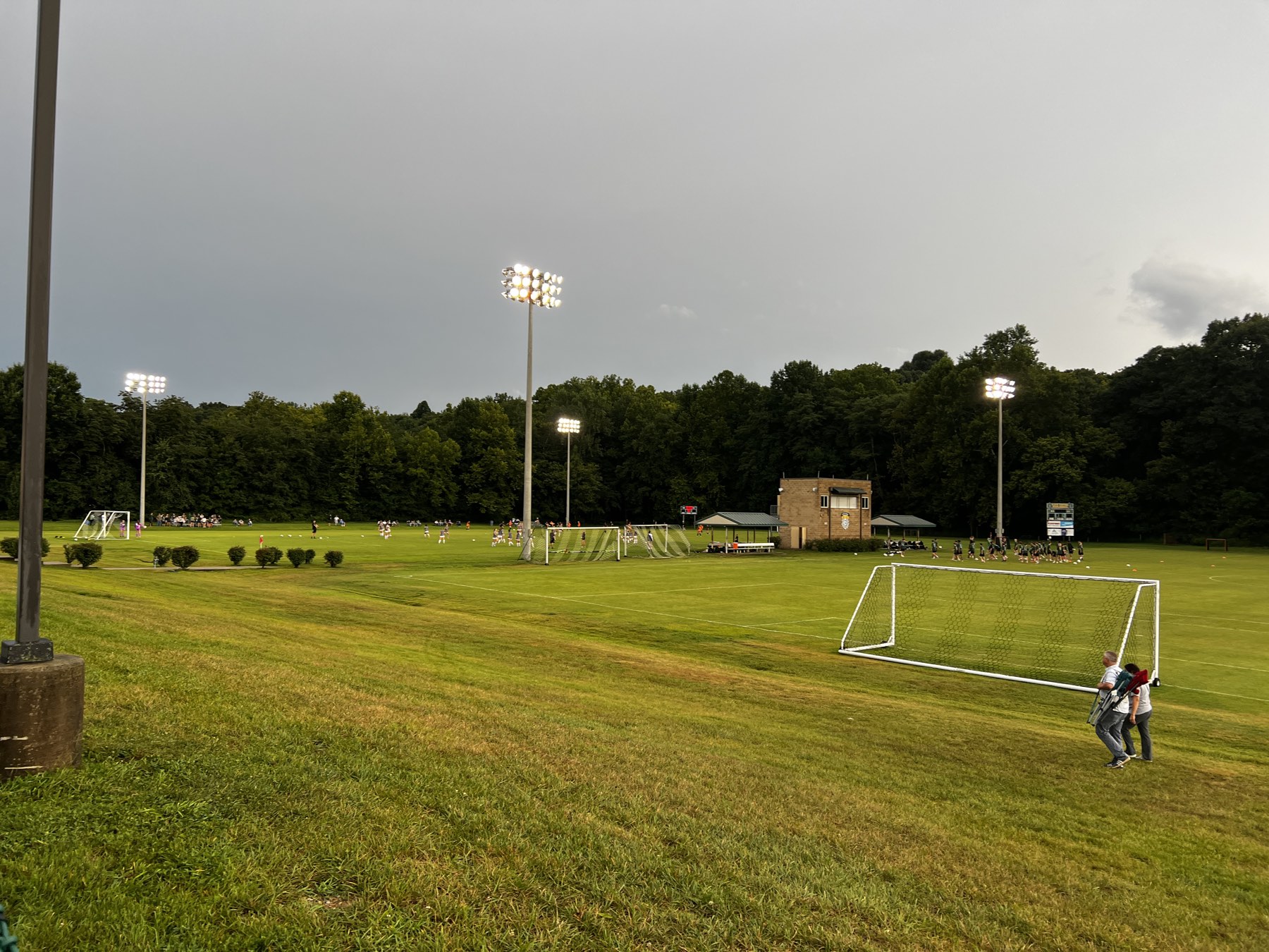 Floodlights over the Floyd Central Sportsplex at dusk
