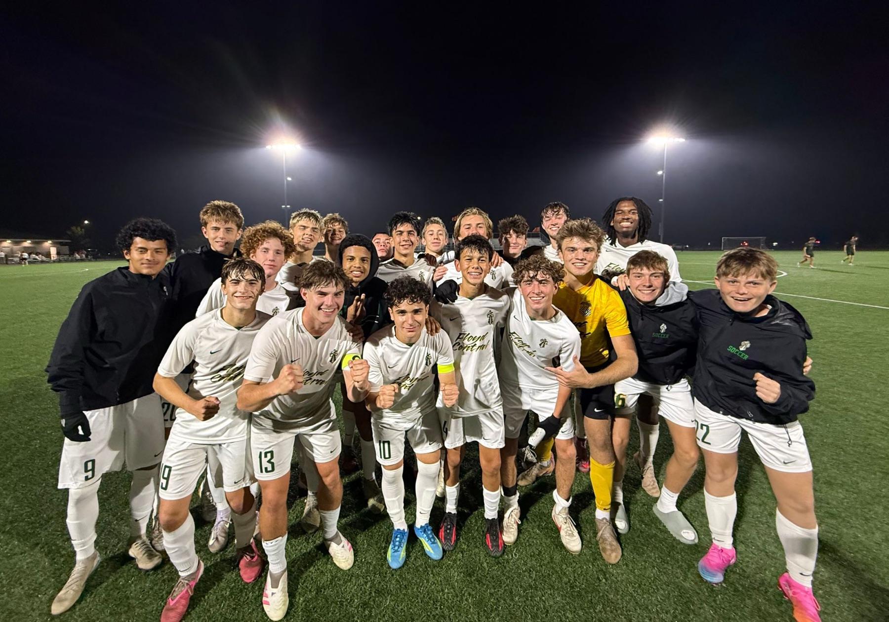 The Highlanders celebrate under the lights after the 1–0 win at Columbus East